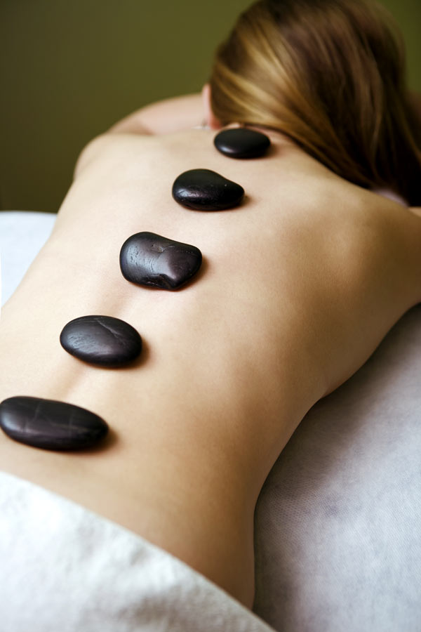 Hot stone massage therapy training at ITEC accredited Helderberg School of Beauty